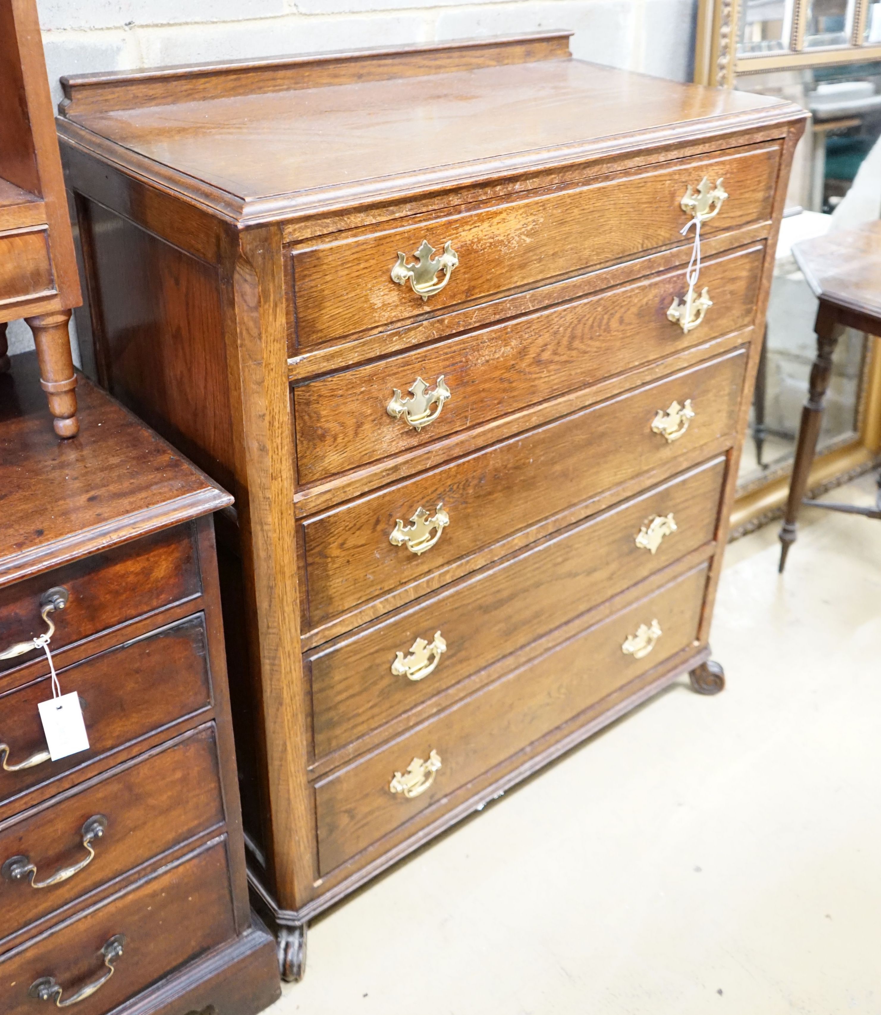 A 1920s oak chest of five drawers, width 89cm, depth 46cm, height 110cm
